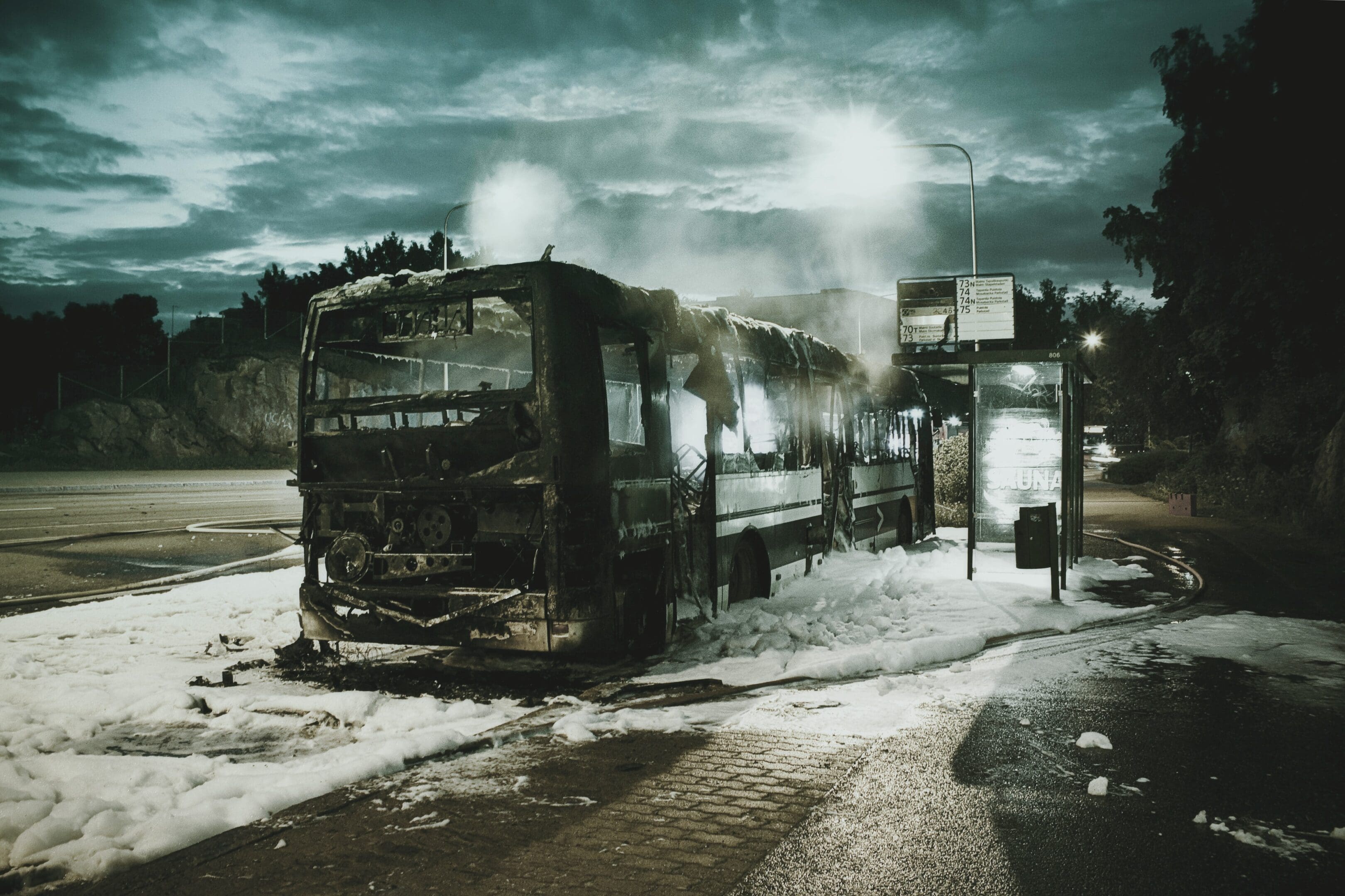 A bus is parked on the side of the road.